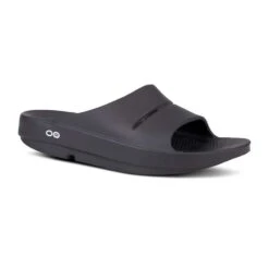 OOfos Unisex OOahh Slide - Black-Regular (D) -TrailBlaze Shoes Shop 1100BLK shot2 932x680 1673bbd5 b0b7 4236 b179 e7177f2aa789